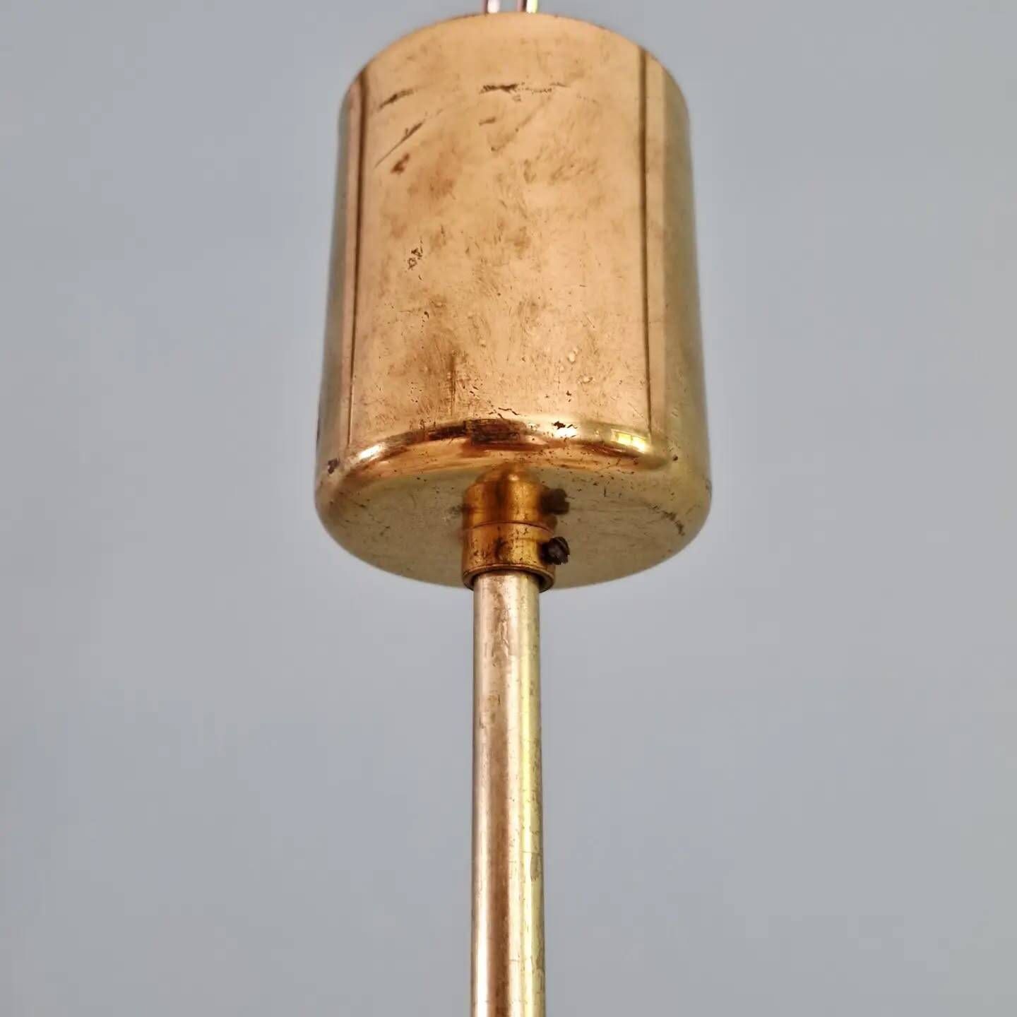 Brass chandelier with amber bubbled glass globes, 1970.
