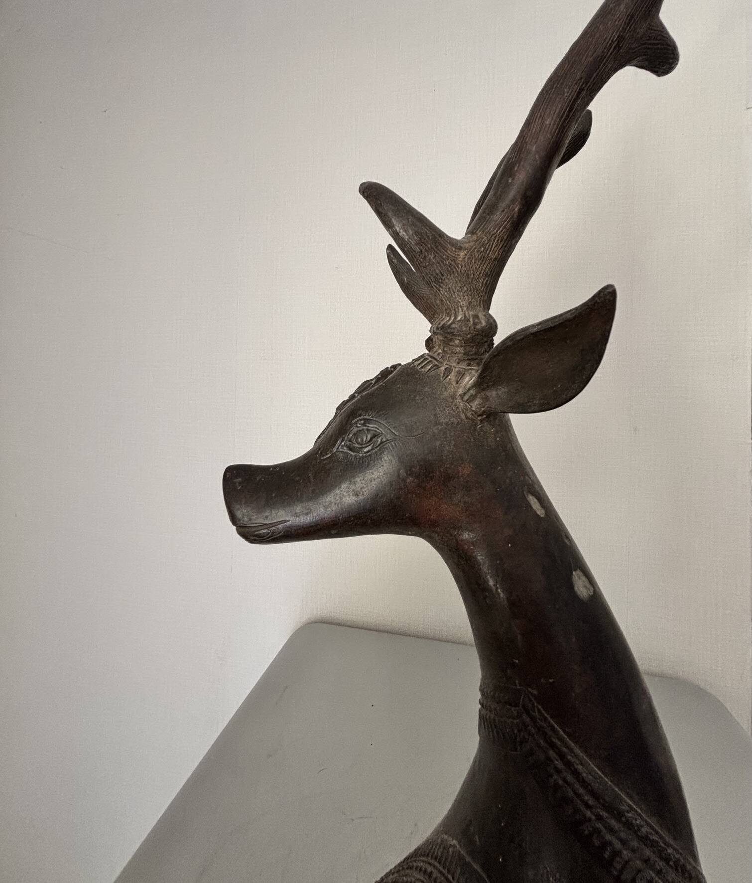Solid bronze deer 20kg (1979), with period sales certificate.