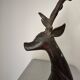 Solid bronze deer 20kg (1979), with period sales certificate.