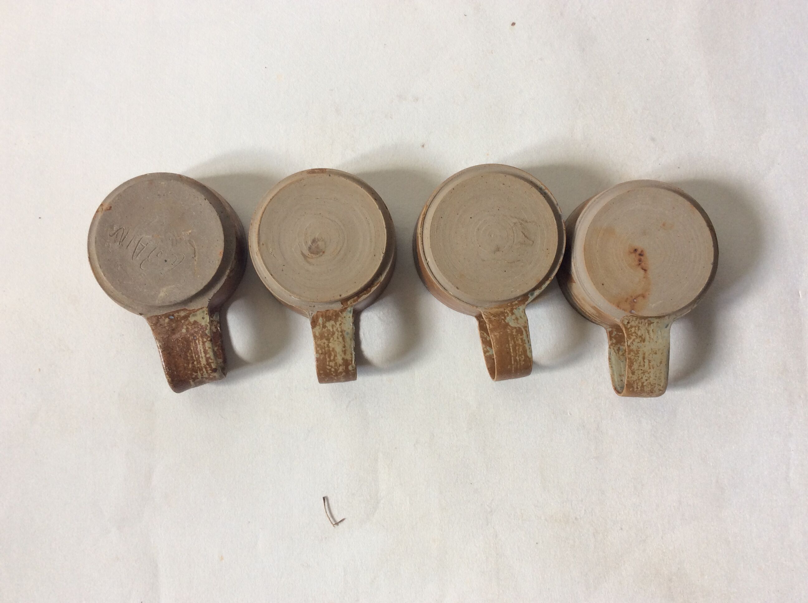 Raw sandstone cups