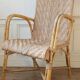 High-backed adult rattan armchair, circa 1960
