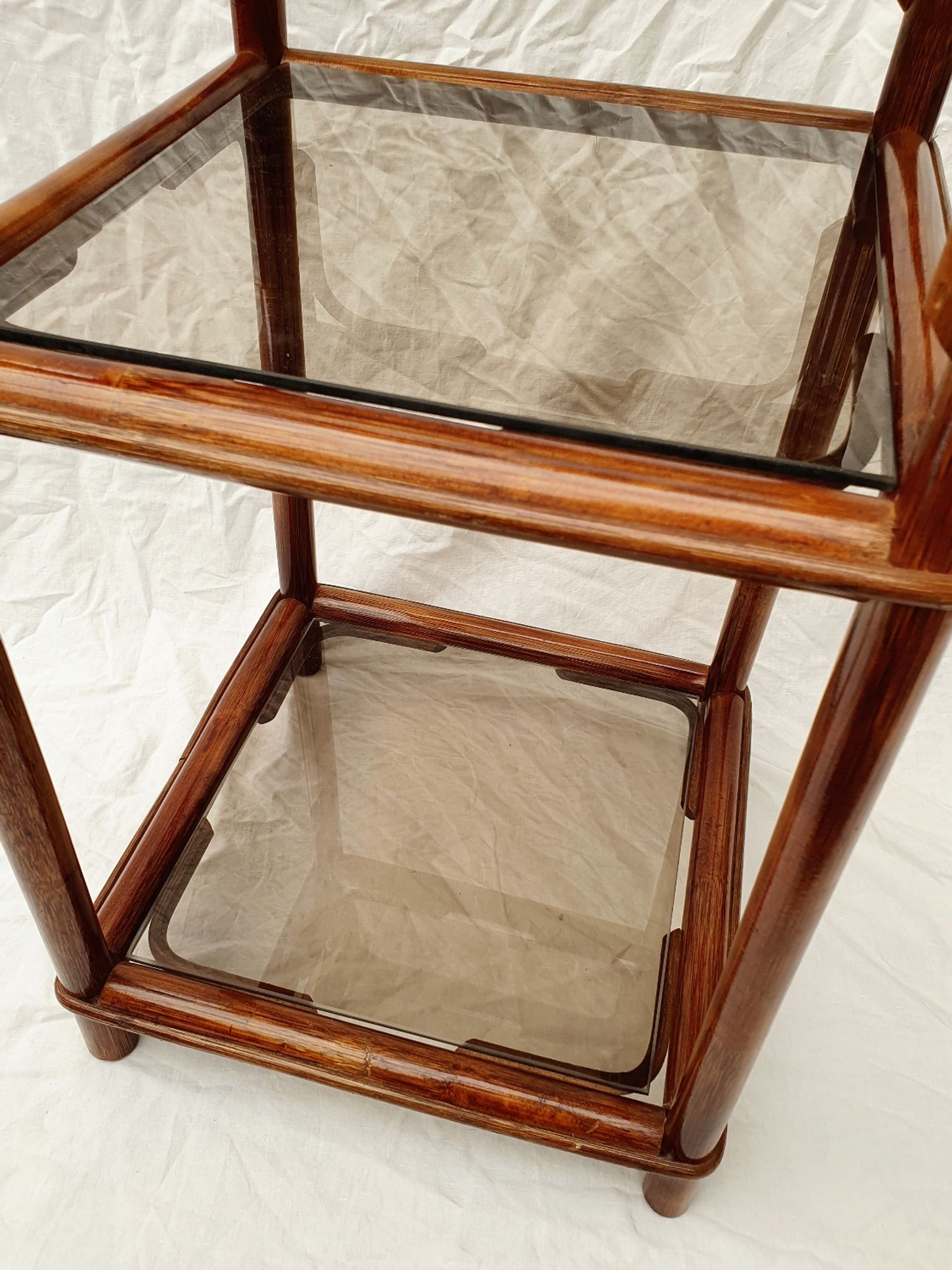 Rattan and smoked glass side table