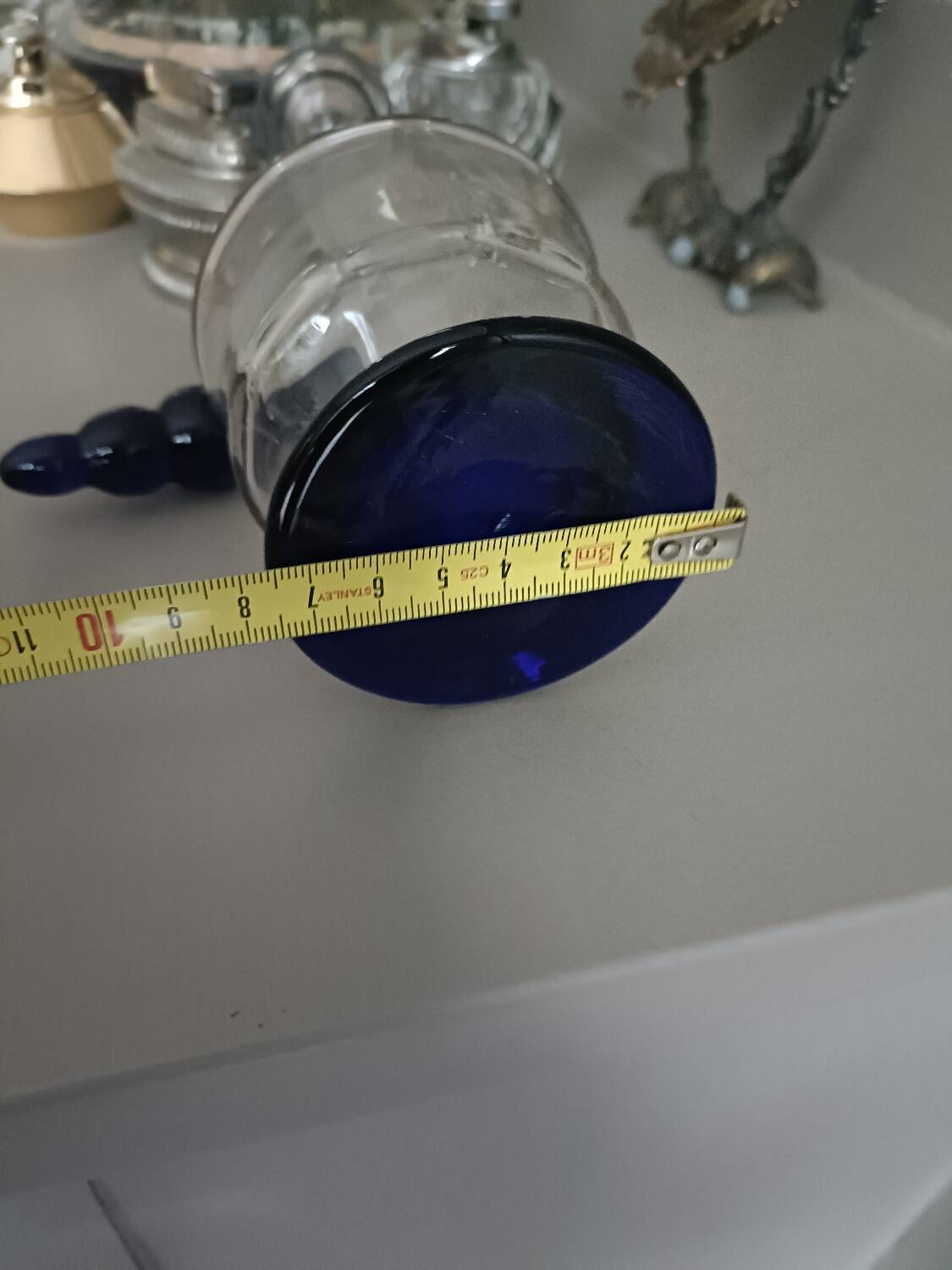 White and blue blown glass carafe