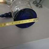 White and blue blown glass carafe