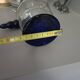 White and blue blown glass carafe