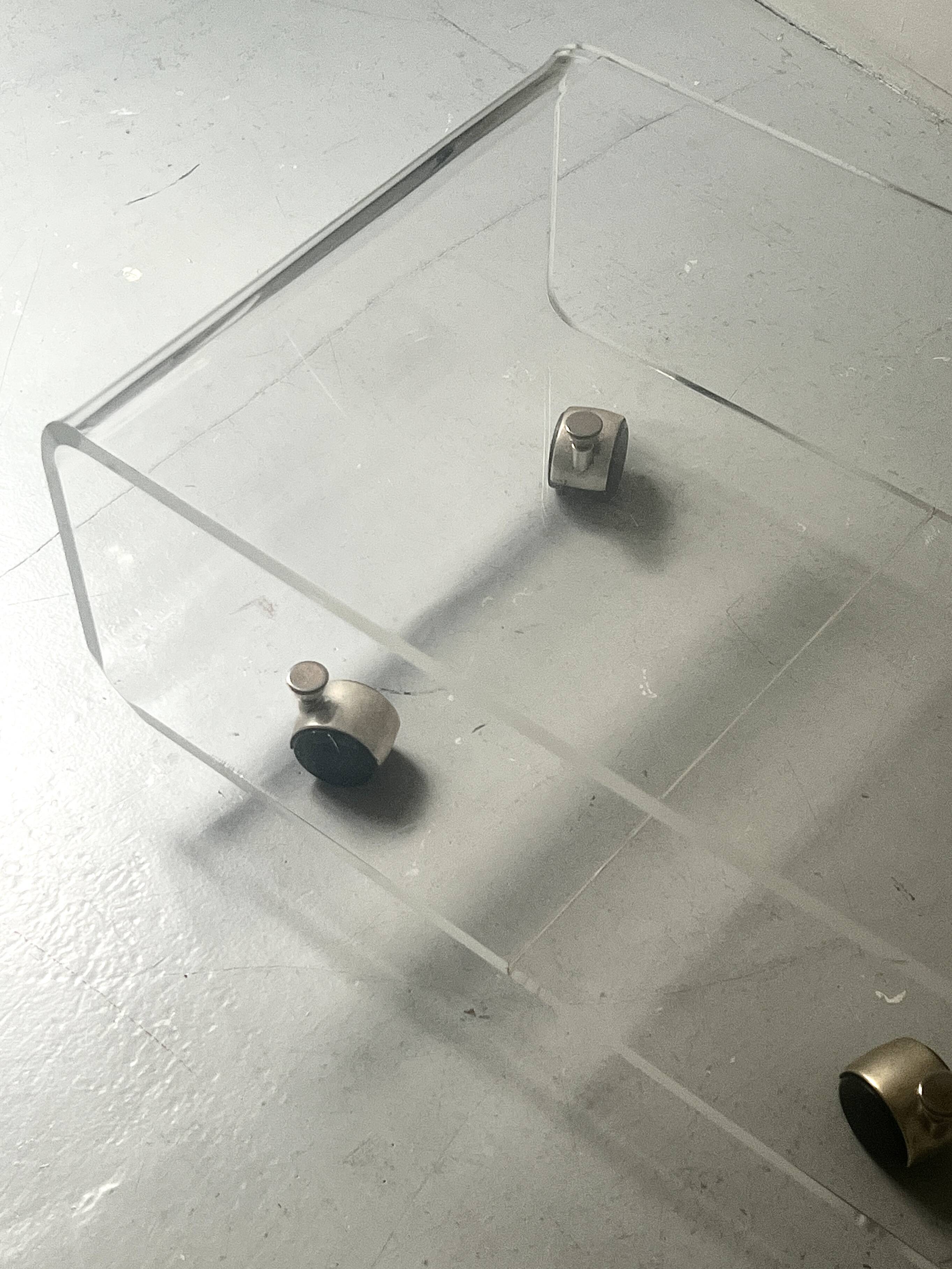 Transparent plexiglass coffee table by Roche Bobois, 1970s design.