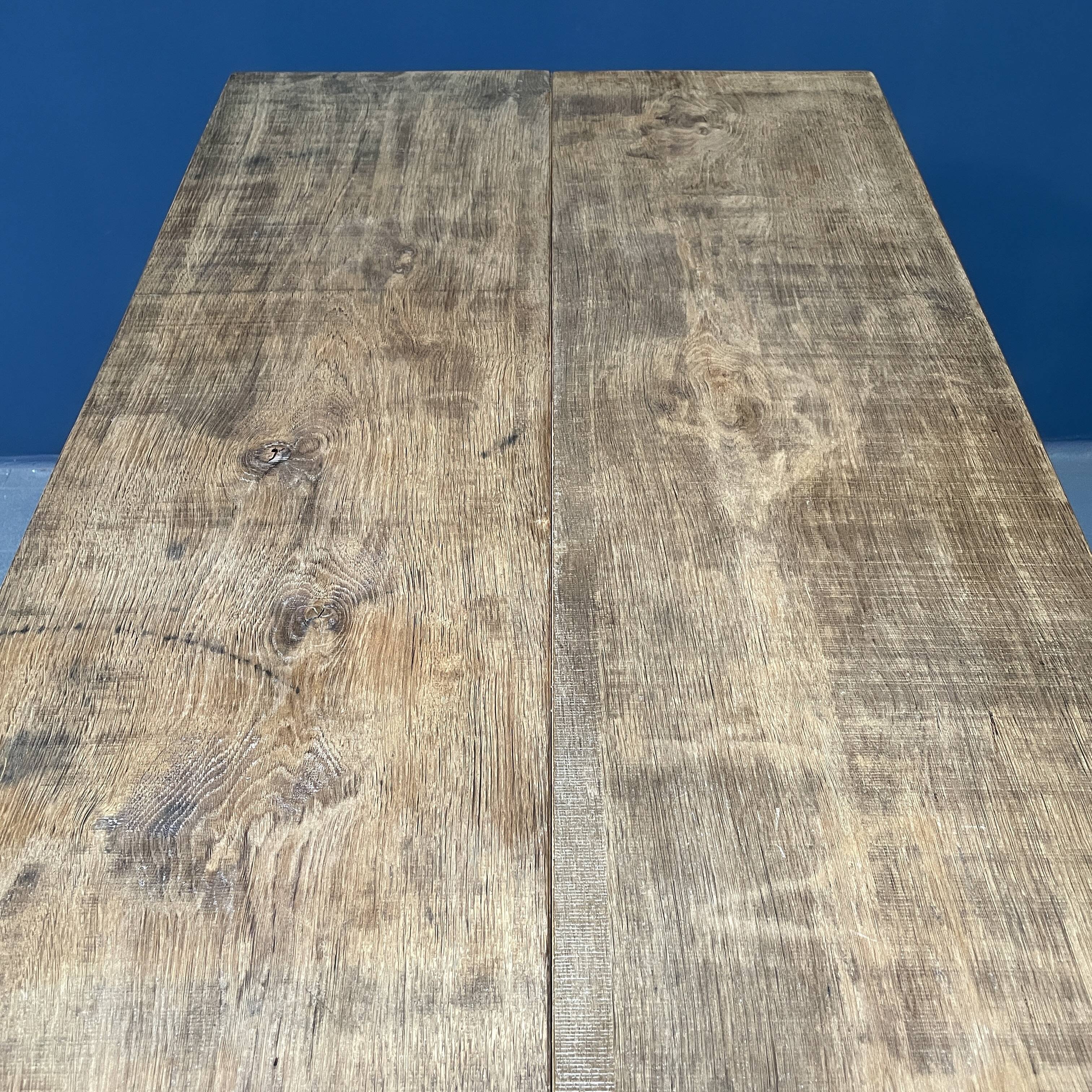 Handmade industrial oak dining table with black metal legs