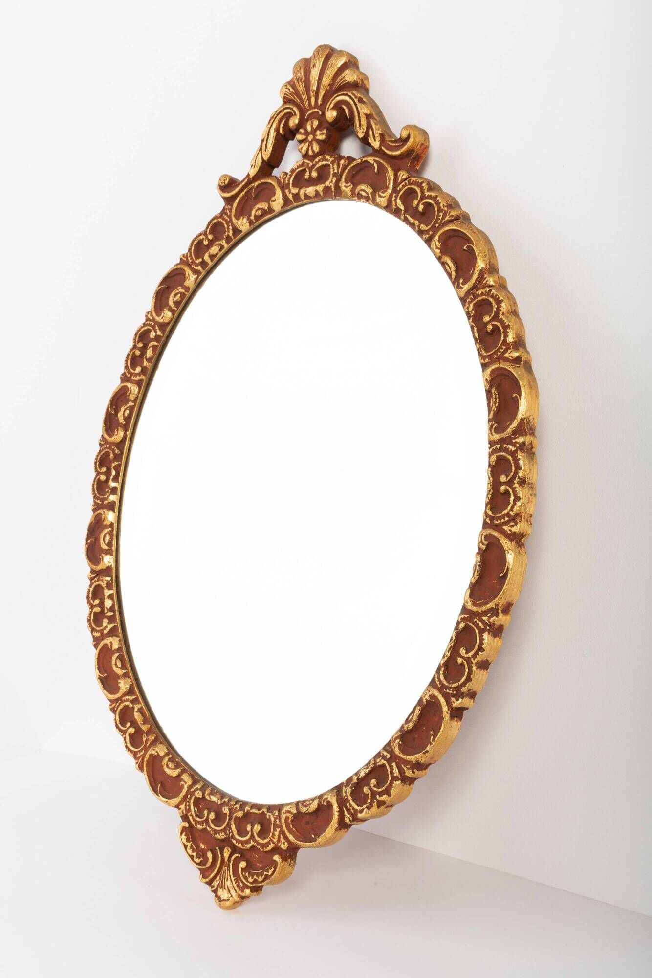 Vintage Italian mirror in gold and brown, gilded woodwork, 1960s.