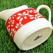 Suite of 6 coffee cups and milk pot, porcelain fine white with floral curly
