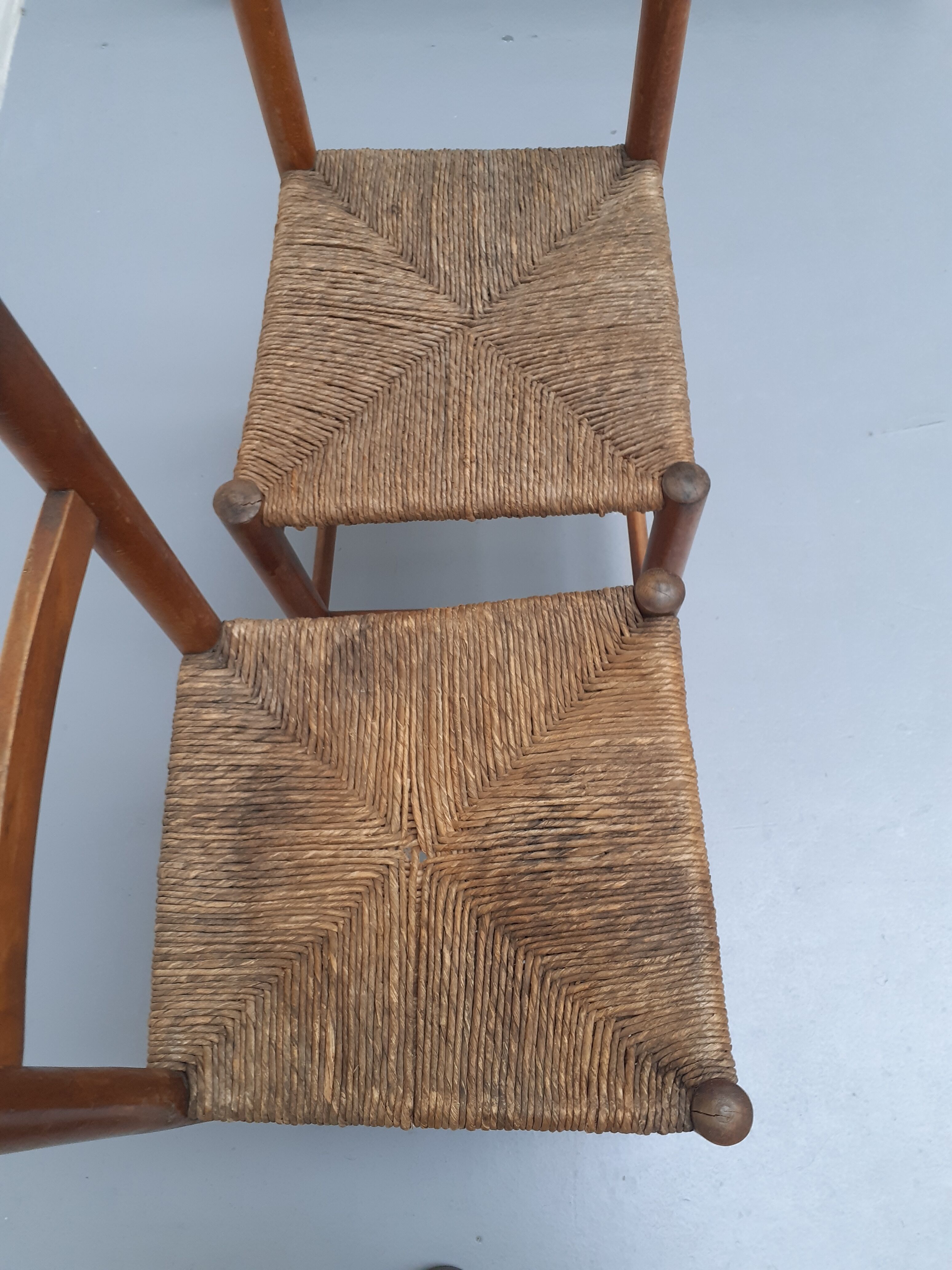 Pair of vintage wooden chairs with mulched seat