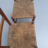 Pair of vintage wooden chairs with mulched seat