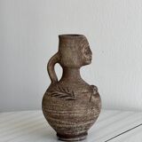 Decorative vase in raw terracotta