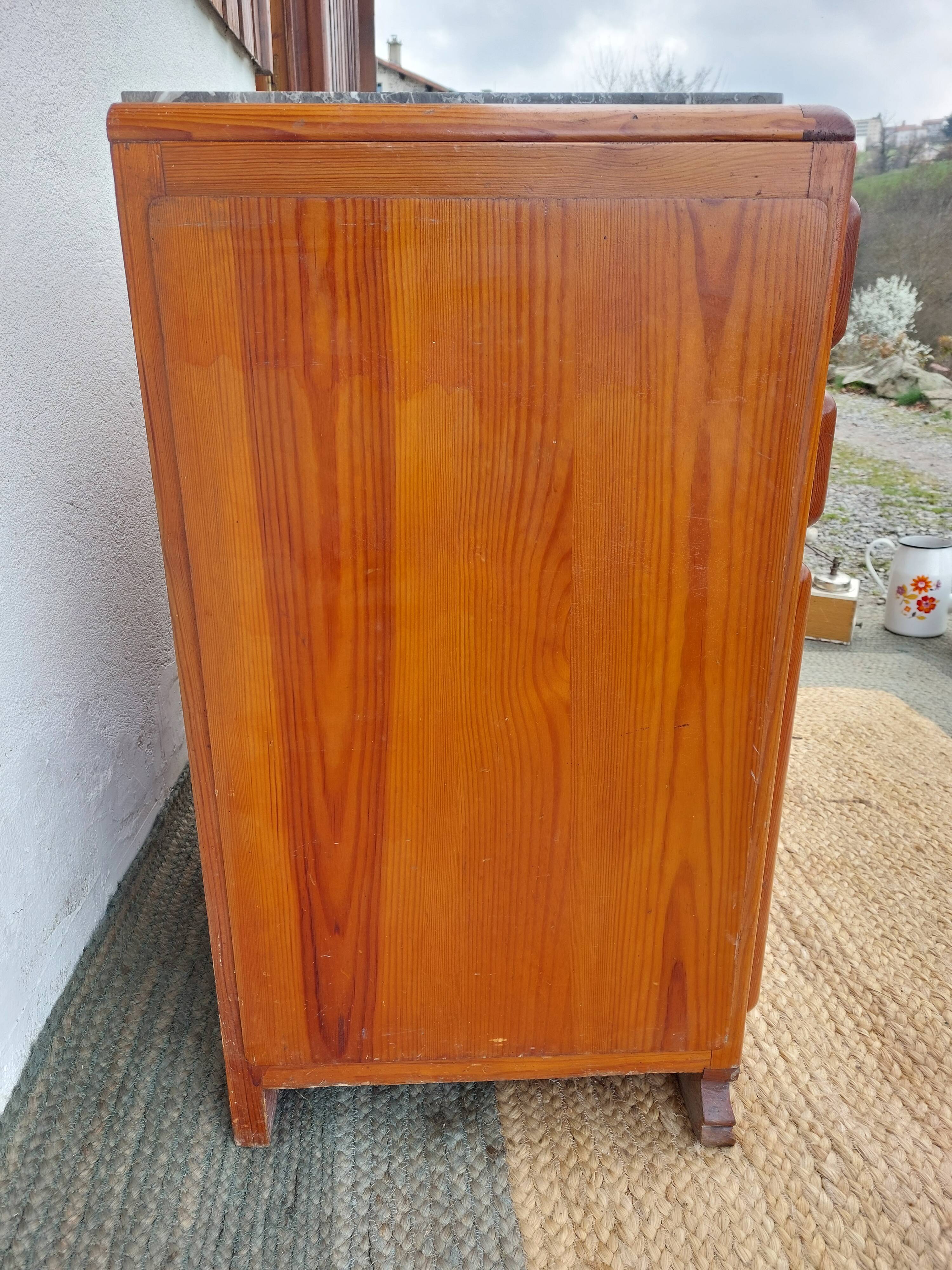 Mado buffet, marble top and asymmetrical doors.