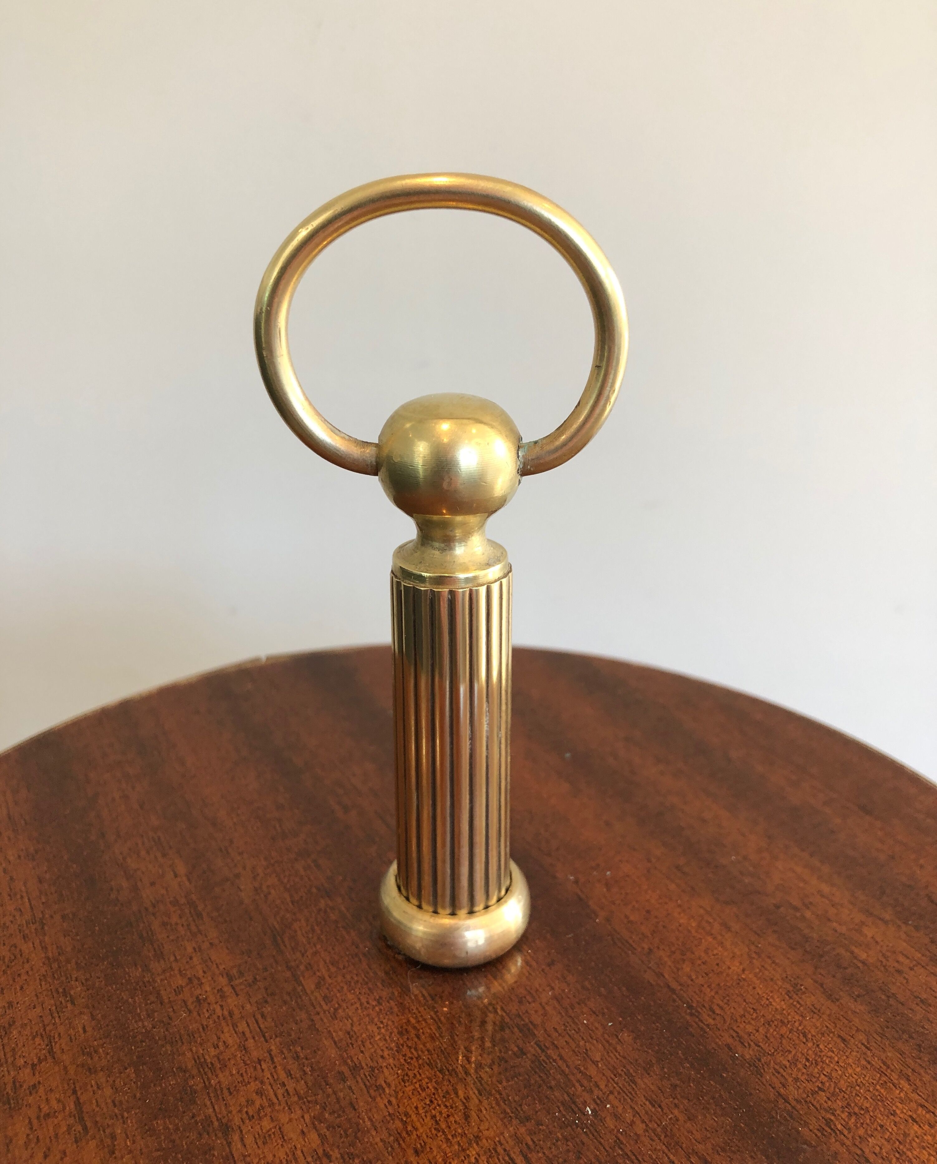 Round table of neoclassical style with triple plateaux 1940