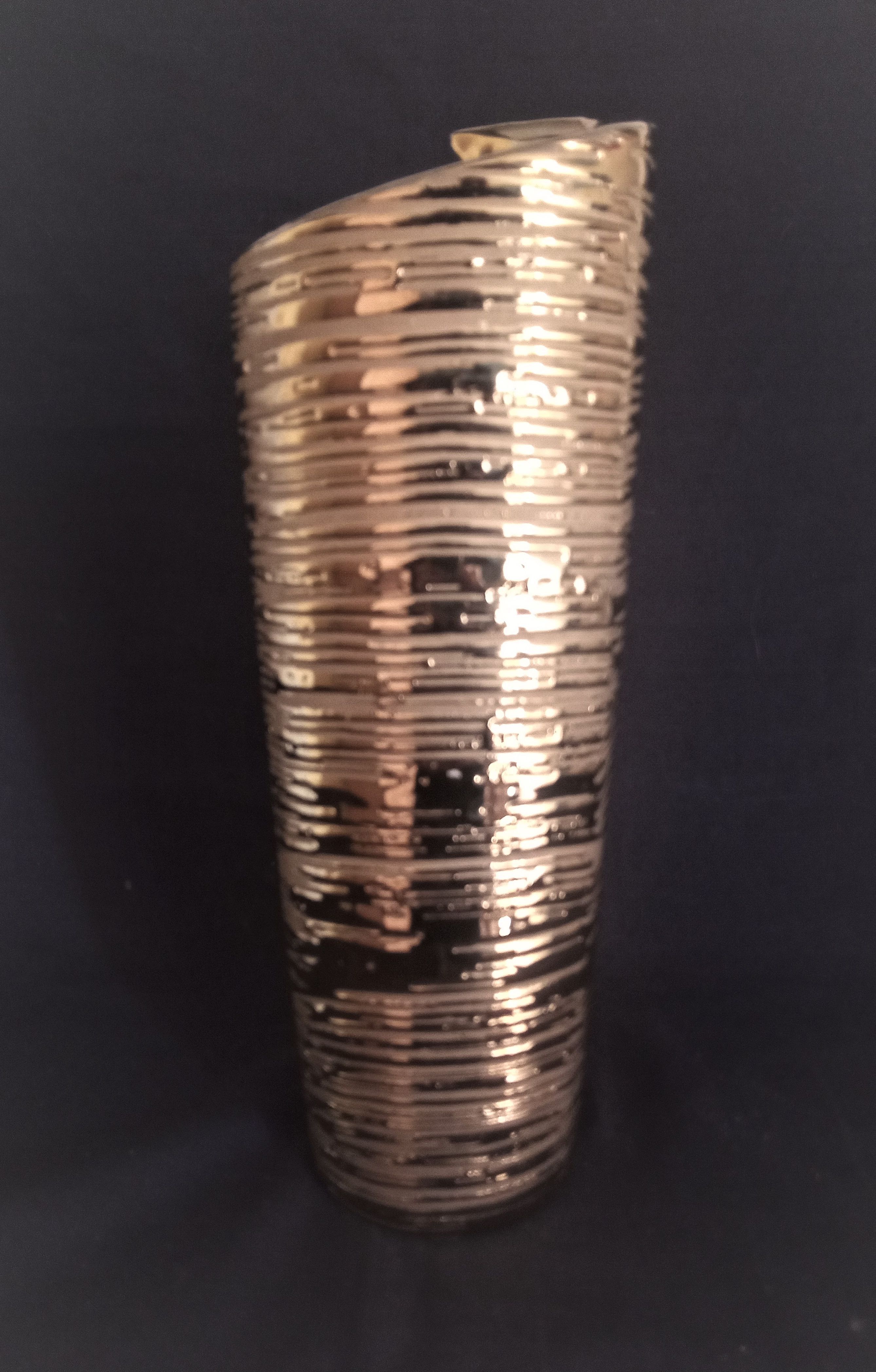 Cubist vase in gilded and ridged ceramic