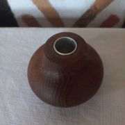 Ball shaped wooden candle holder