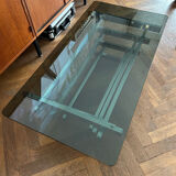 70s design coffee table in rectangular glass with chrome legs.