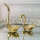 Couple of brass swans