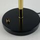 Rare black and gold UFO table lamp by Louis Kalff for Philips.