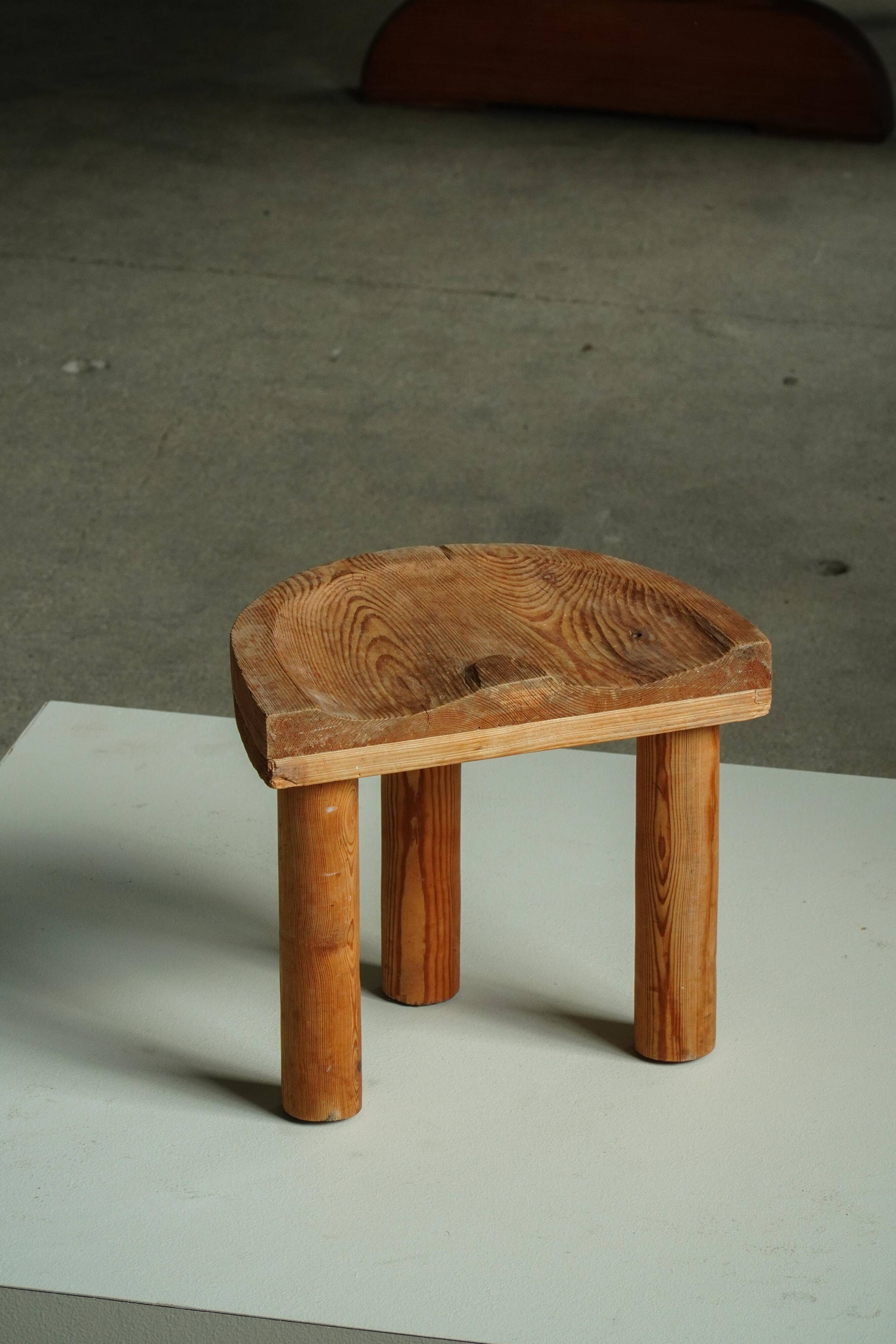 Carved pine stool, Swedish folk art, mid-20th century, 1950s.