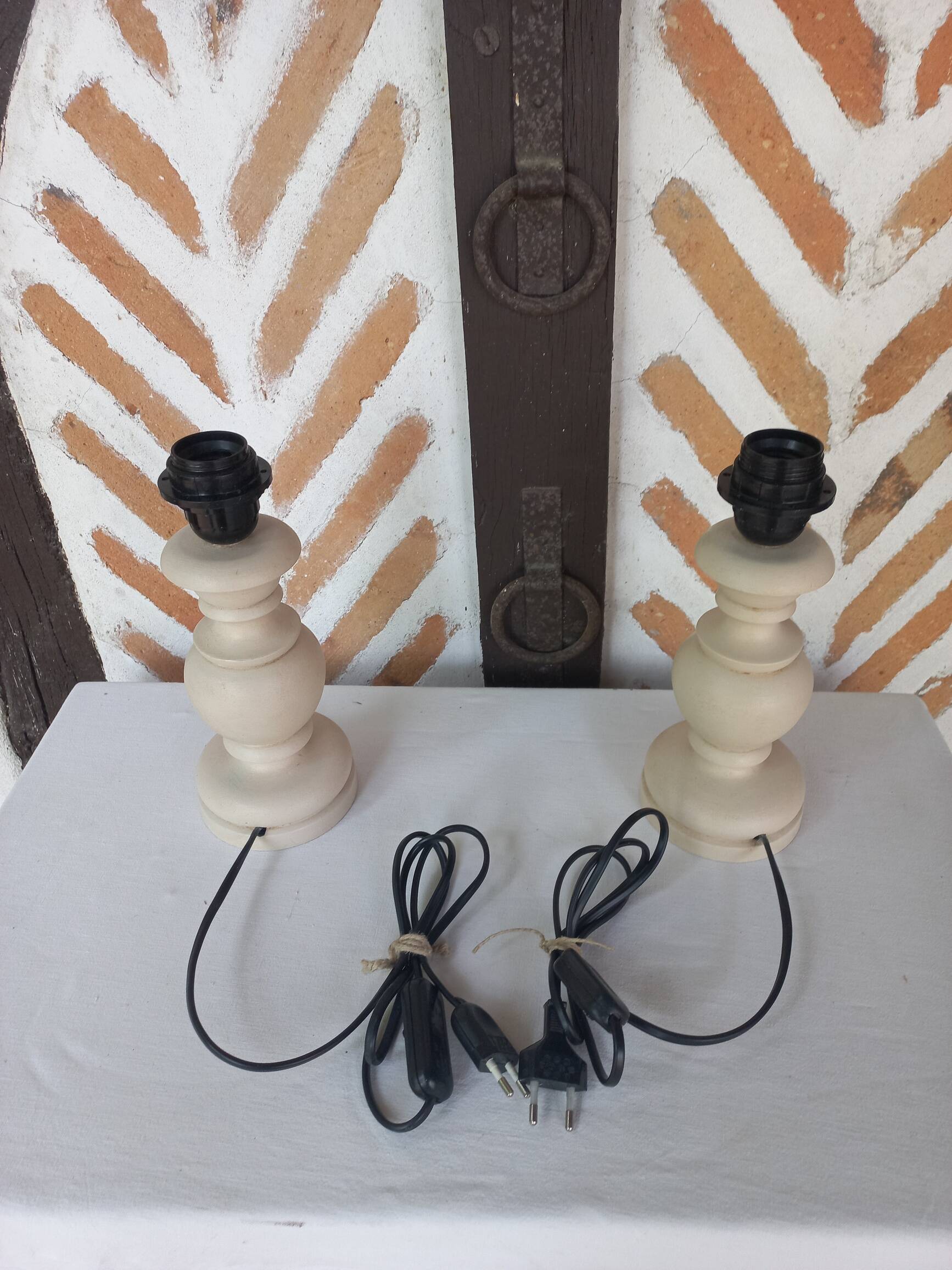 Pair of off-white patinated lamp bases