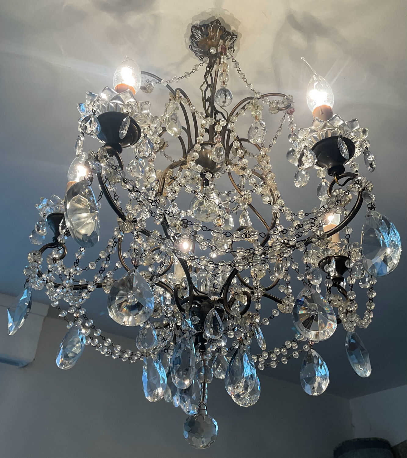 Antique cage chandelier with rock crystal pendants