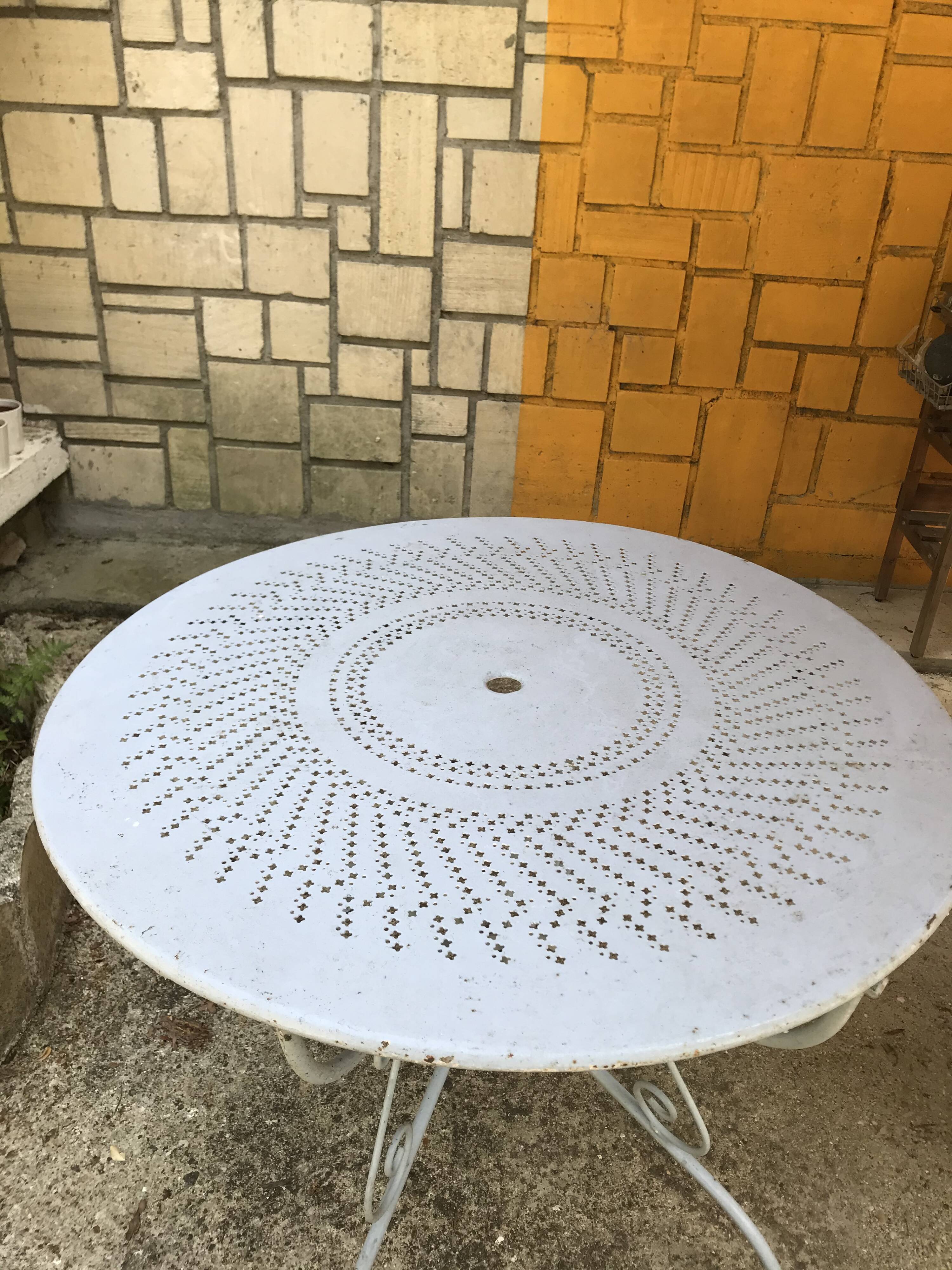 Old wrought iron garden table