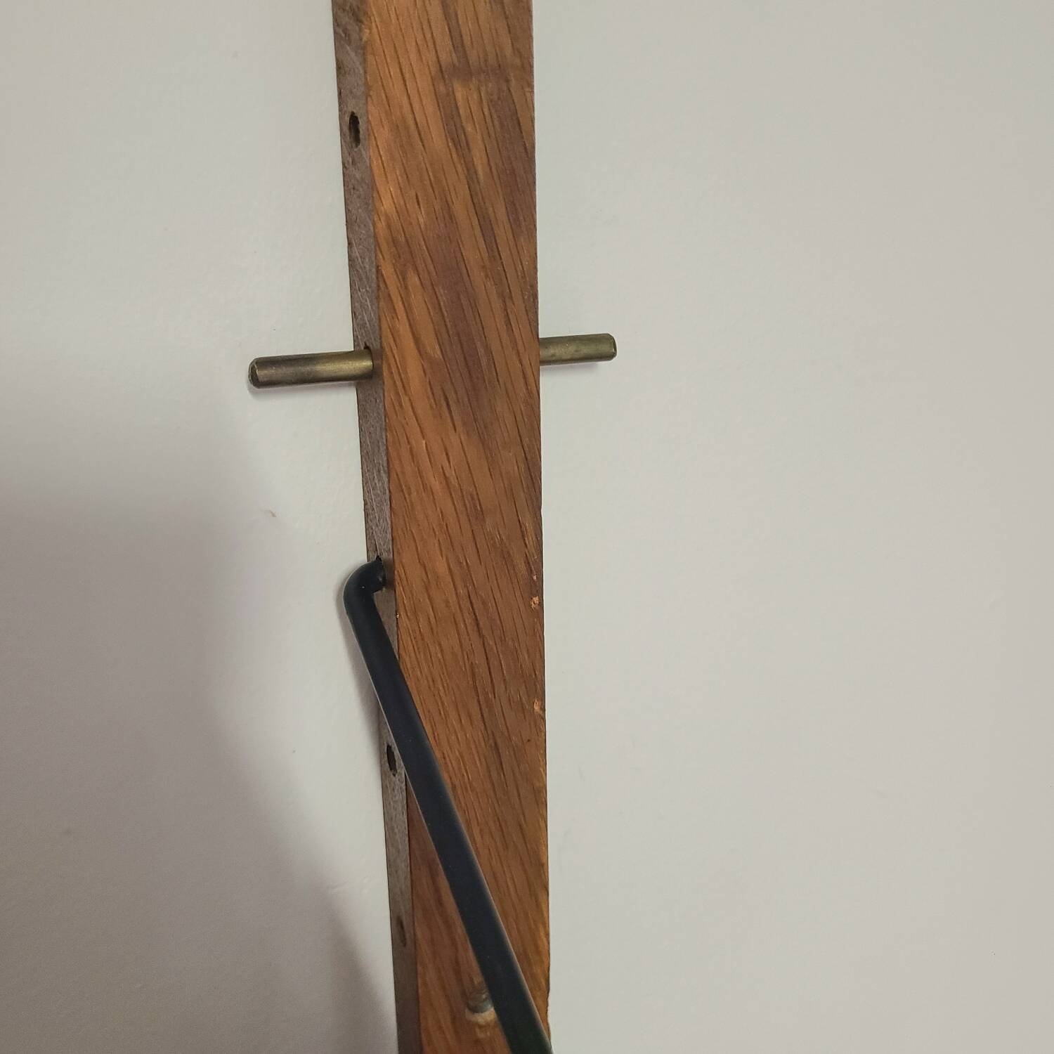 Danish wall-mounted bookshelf designed by Poul Cadovius, Scandinavian design.