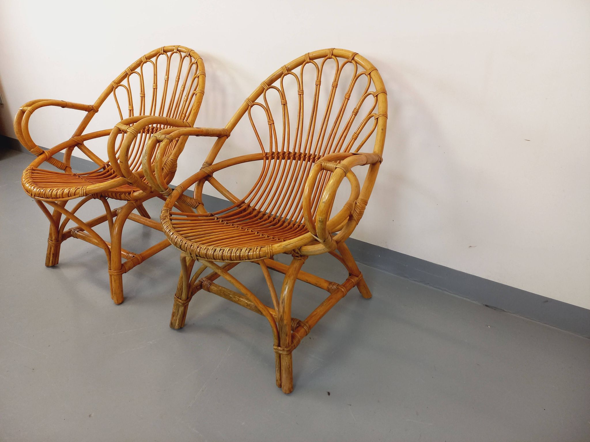Pair of vintage rattan armchairs from the 60s