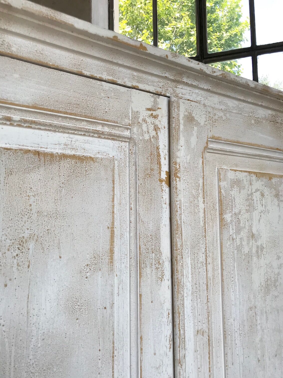 Antique wardrobe in patinated pine