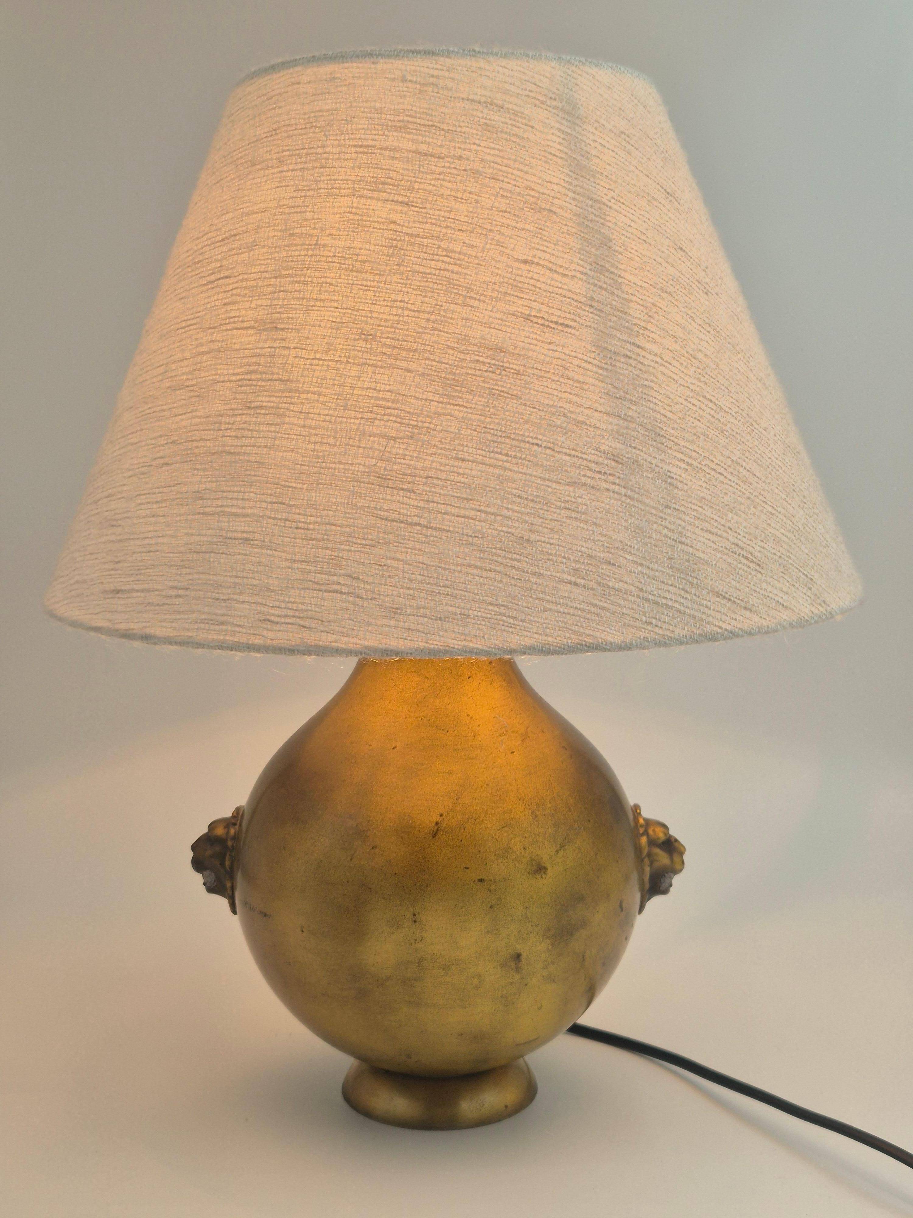 Table lamp in brass with lion decor, Swedish Grace 1920/30s