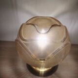 Textured amber globe wall light