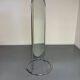 Large freestanding chrome metal full-length mirror in 1970s design.