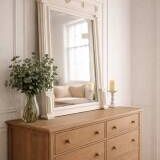 Antique bevelled mirror, frame in pearl grey patinated wood.