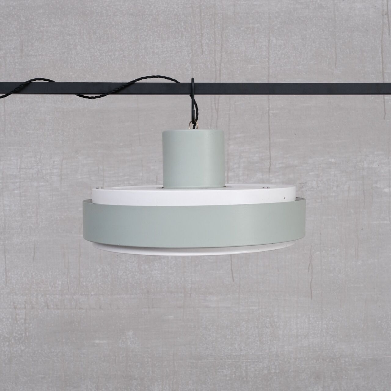 Mid-century steel and glass pendant by RAAK