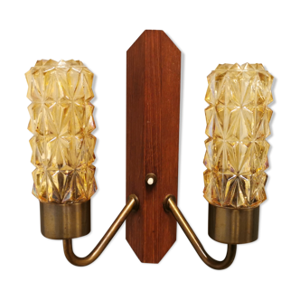 Older Danish wall lamp, with double light source, made of teak wood, amber colored glass and brass