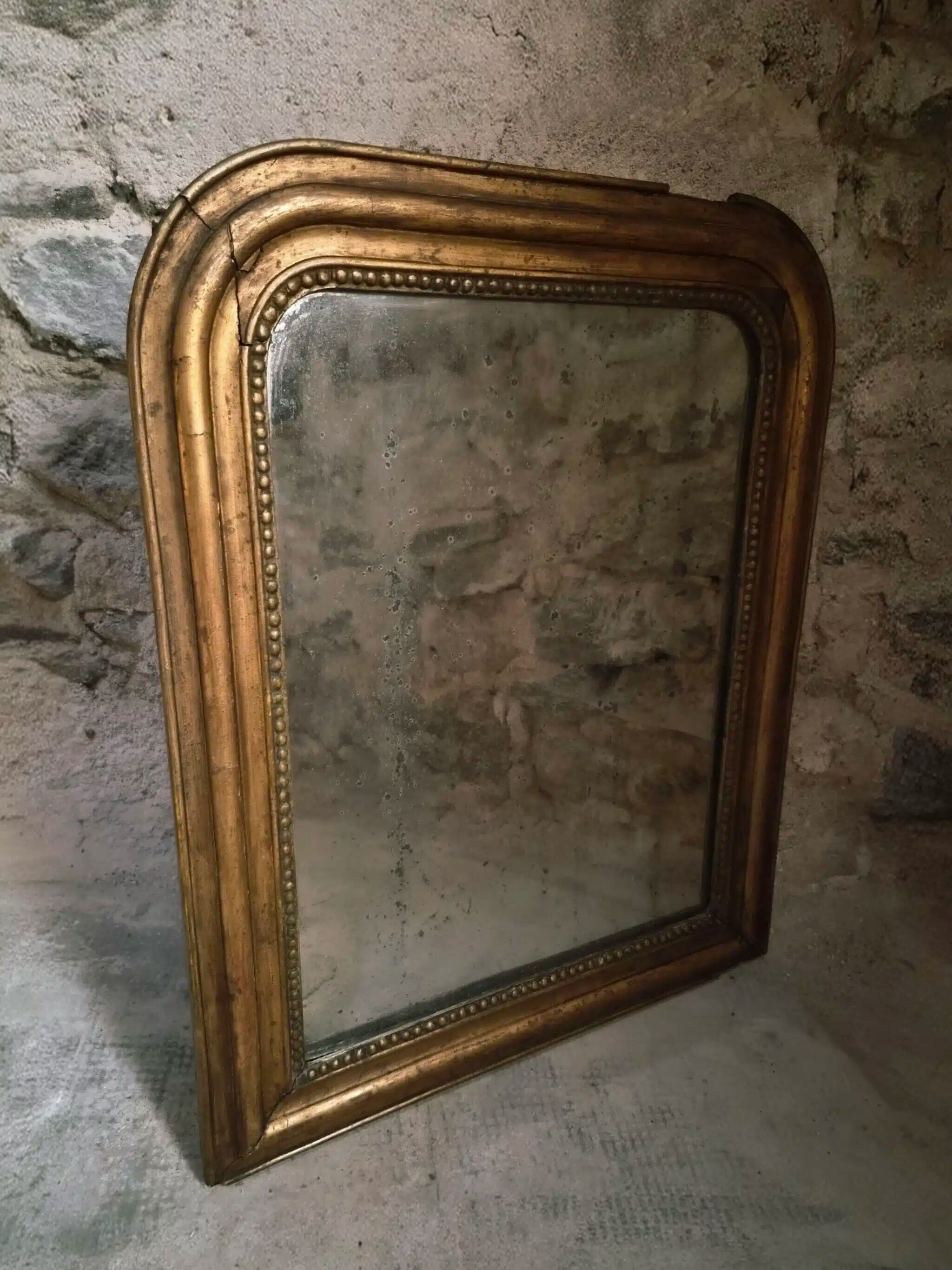 Antique French Louis Philippe mirror, gilded mercury mirror, 19th century.
