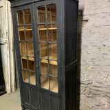 Former black patinated showcase