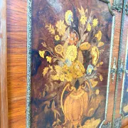 An antique French Louis XVI-style marble-top side cabinet