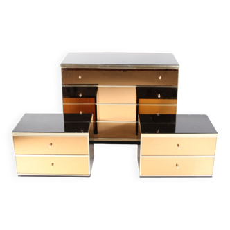 Set of chest of drawers and pair of bedside tables circa 1970