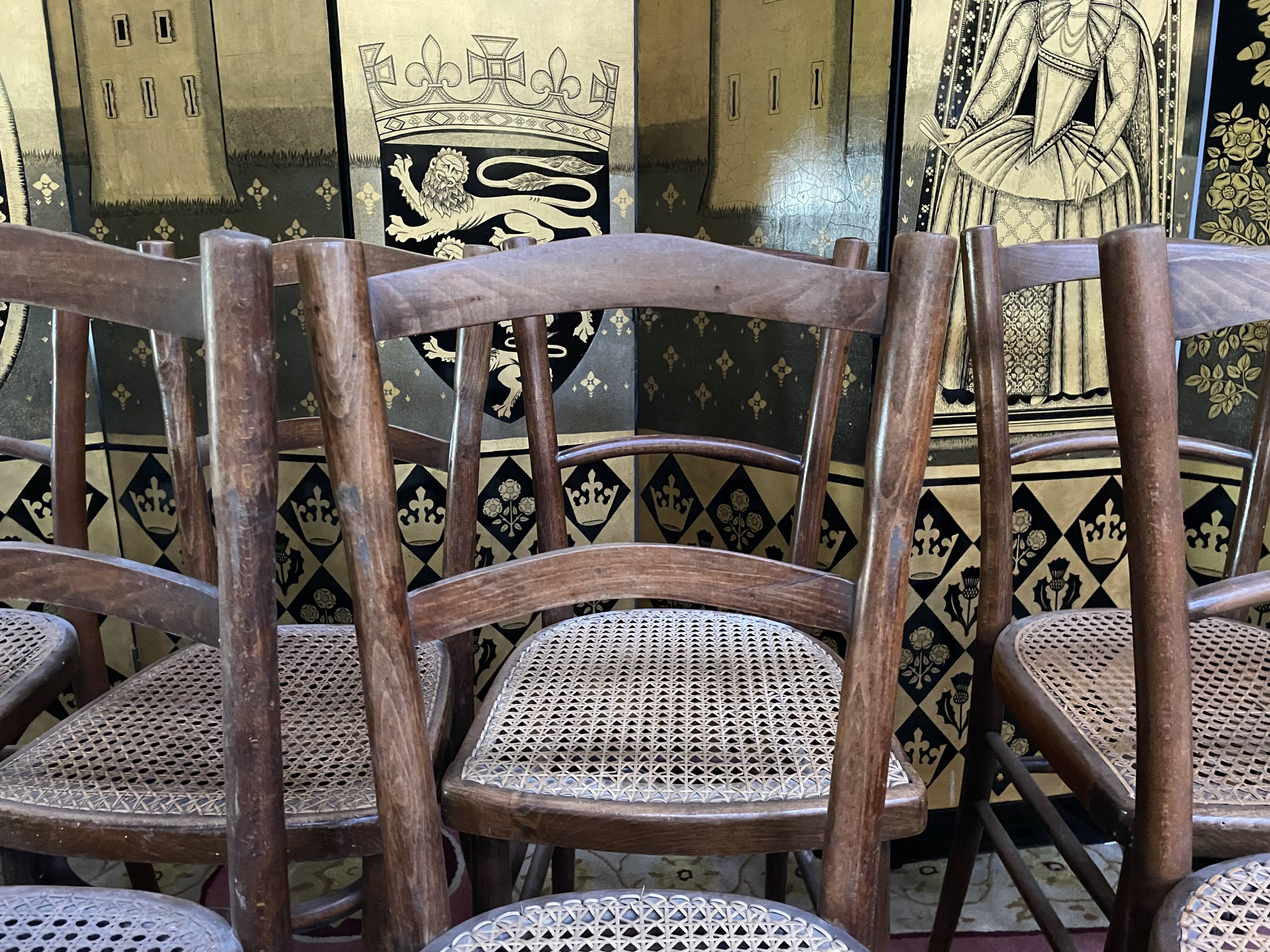 Suite of 10 bistro chairs in cannage