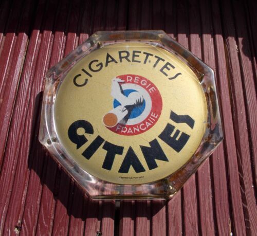 Picks up vintage advertising money Gitanes