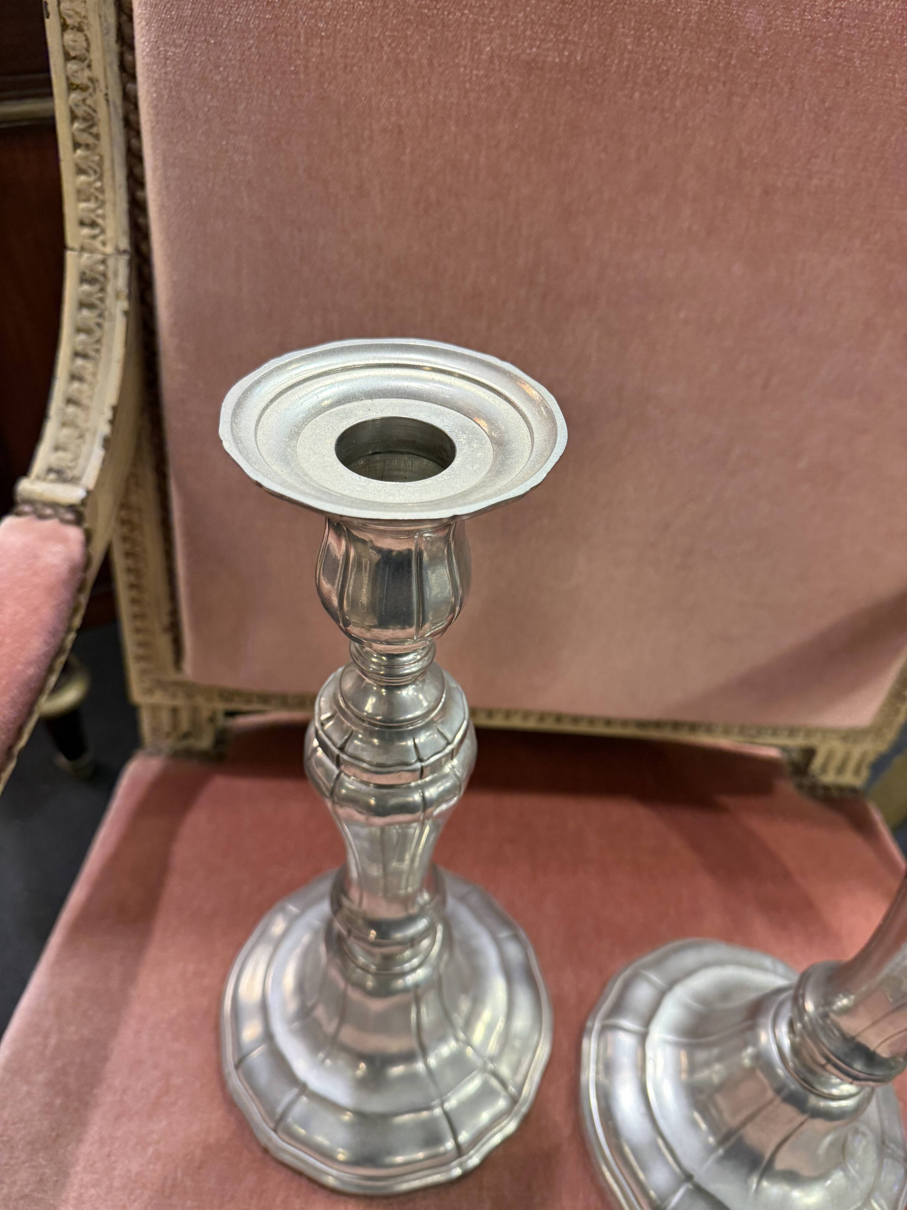 Pair of metal candlesticks