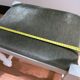 Repose-pied vintage en bois et velours