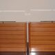 Pair of 60s veneer bedside tables with brass decorations