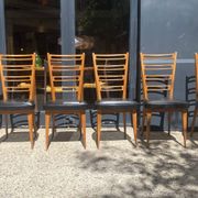 6 chaises bois et skaï noir années 60