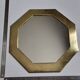 Octagonal brass mirror signed Frankie d'Homborchveld, 47 x 50 cm