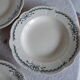 4 assiettes semi creuses terre de fer Longchamp