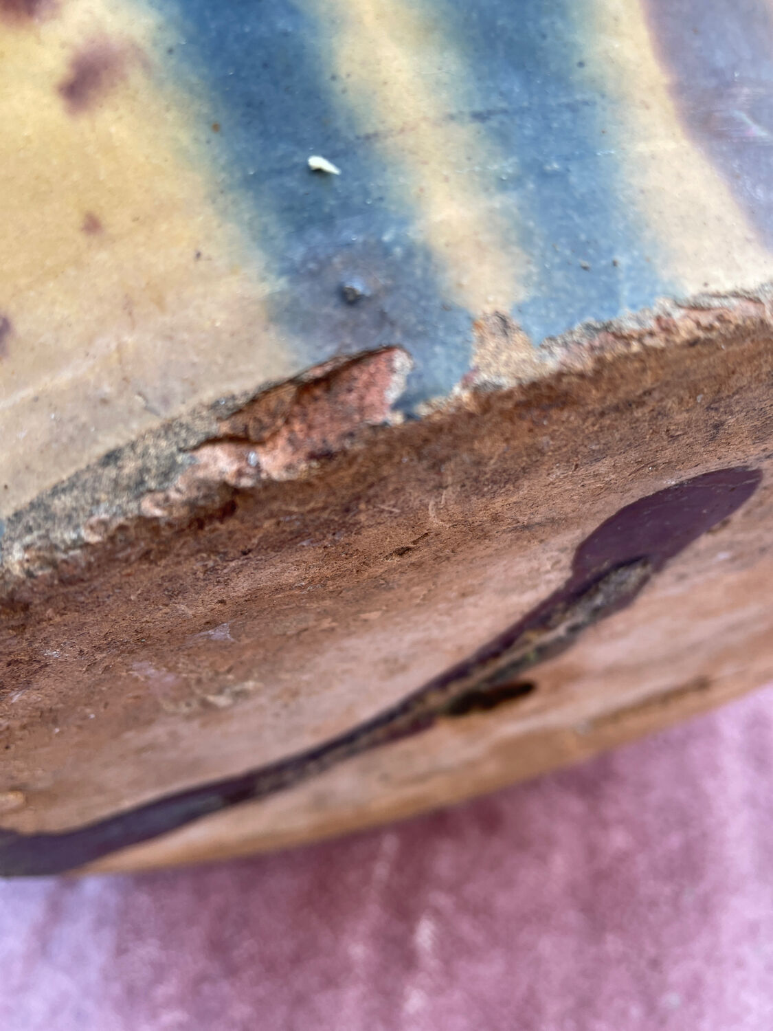 Old flower jar with two glazed earth handles