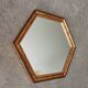 Miroir vintage hexagonale bohème chic en bois doré
